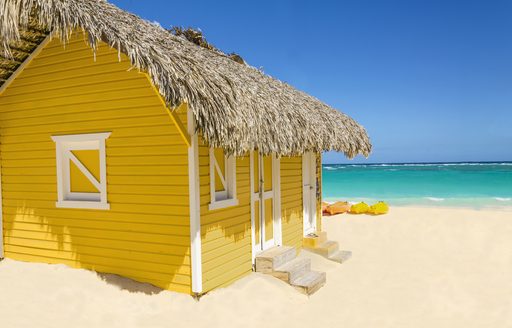 Yellow hut on beach in Bahamas