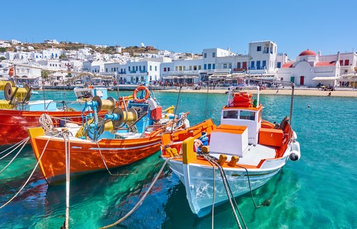Small boats in Mykonos harbor in Greece