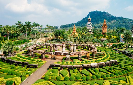 Nong Nooch Tropical Botanical Garden is a 500-acre botanical garden and tourist attraction in Chonburi Province, Thailand