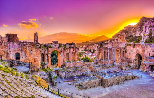 Greco-Roman theatre in Taormina in Sicily at sunset
