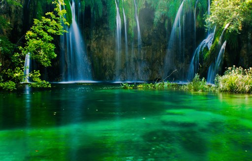 Serene, vividly green waterfalls in Croatia